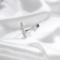 Elegant silver angel wing titanium ear stud with kite-shaped crystal on white silk - Angel Wings (A1565-1) / Single Piece / White