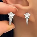 Detail view of dainty silver five-point star huggie earrings with sparkling pavé crystals - Star Zirconia Ear Hook (3399)