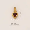 Elegant gold-plated stainless steel heart pendant featuring a red zircon gemstone inlay - January Birthstone Pendant / Gold