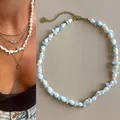 Collana bohémien fatta a mano con conchiglie e pietre azzurre per look da spiaggia - Collana di Perline con Conchiglia e Scaglie