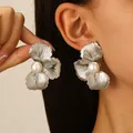 Elegant silver-toned petal flower stud earrings featuring a central faux pearl for women - Artificial Pearl Inlay Petal (6999) / Silver