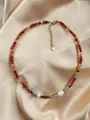 Close-up of handmade natural stone necklace with freshwater pearls and gold-tone clasp - Necklace 4 (38+5cm)