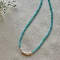 Detailed macro view of a blue natural stone beaded choker necklace with white pearls - Necklace 12 (38+5cm)
