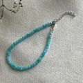 Gedetailleerde weergave van handgemaakte ketting met blauwgroene kralen van natuursteen - Armband Stijl 12 (17+3cm)