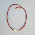 Detail view of handmade red natural stone necklace with two freshwater pearls - Necklace 15 (38+5cm)