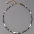 Close-up of colorful natural stone beads and freshwater pearls on a delicate necklace - Necklace 26 (38+5cm)