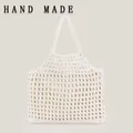 Handgewebte cremefarbene Baumwolltasche mit Mesh-Hohlmuster für den sommerlichen Strand - Weiß