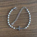 Elegant stainless steel pearl necklace featuring a silver sideways cross pendant on wood - Artificial Pearl Cross Bracelet / 16+5cm / Silver