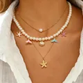 Collana bohémien a più strati con ciondoli a stella marina e perle artificiali - Collana Multistrato Vacanza Oceano (1561)