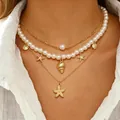 Collana boho a strati per donna con ciondoli a stella marina, conchiglie e perle - Collana Bohémien a Tre Strati (1560)