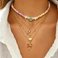 Set di collane bohémien a strati con stella marina, conchiglia e perline. - Set Collana Multistrato Tema Oceano (A-775)