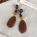 Vintage wooden geometric drop earrings in warm autumn tones with dark brown wood texture - Pebble Wood Style (28420E)