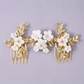 Elegant bridal hair comb set featuring white ceramic flowers and golden crystal leaves. - Casual Wear Hair Comb HS-J6745G