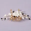 Elegant bridal hair comb with white flowers, pearls, and black beads on gold metal base - Versatile Timeless Hair Comb HS-J7221G