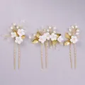 Elegant bridal floral hair pin set featuring white flowers, pearls, and gold leaves for weddings - Wedding Dress Hair Pin HS-J7021G