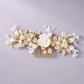 Elegant bridal hair comb with white ceramic flowers, gold leaves and pearls accessory. - Photo-Worthy Hair Comb HS-J6717G