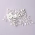 Elegant bridal floral hair comb with white ceramic flowers, pearls, and crystals - Photo-Worthy Hair Clip HS-J5435