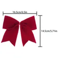 Detailed size guide for red velvet Christmas bow showing 16.5cm width and 14.5cm height - 14.5cm x 16.5cm / Red