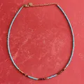 Vue détaillée du collier en perles d'œil de tigre et de turquoise vintage - Oeil de Tigre Turquoise Fin / 38+5cm / Bleu Clair Brun