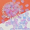 Macro detail of 18x13mm gradient purple floral glass beads for DIY jewelry making - Purple Blue (L107# Relief Tag)