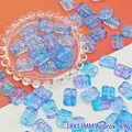 Detail view of 18x13mm blue and purple floral glass beads for jewelry making - Deep Purple (L113# Relief Tag)