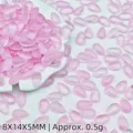 Detailed macro view of 8x14mm translucent pink teardrop glass beads for DIY jewelry crafts - Light Pink