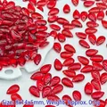 Macro view of 8x14mm red teardrop glass beads for DIY jewelry and hair accessories - Red
