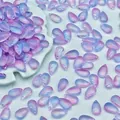Detailed view of 8x14mm pink and blue gradient teardrop glass beads for DIY jewelry - 8x14x5mm / Purple Blue