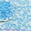 Macro view of 8x14x5mm light blue teardrop glass beads for DIY jewelry making crafts. - Light Blue