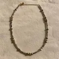 Close-up of dalmatian jasper beaded necklace with gold spacers on linen background - Mixed Size Leopard Skin Jasper (38+5cm) / One Size