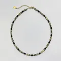 Detail of a beaded necklace with dalmatian jasper and black accents - Spacer Beads and Leopard Skin Jasper (38+5cm) / One Size