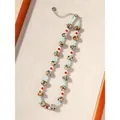 Detail view of a heart-shaped Dalmatian jasper beaded necklace on a textured background - Heart Pattern Natural Stone (38+5cm) / One Size