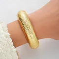 Bold chunky gold-toned wide bangle with a unique spiral ribbed texture design for women - 6357701hb