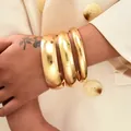 Fashionable gold-plated smooth metal bangle set of three for women's statement styling - 6377901