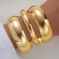 Fashionable gold plated metal chunky bangle set with a smooth polished finish for women - 6543201hb