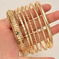 Stackable gold-toned metal bracelet set with twisted and hammered textures for women - 6779001HB