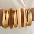 Fashionable golden metal and resin bangle bracelet set for women in stacked style - 6794601HB
