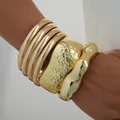 Chunky gold metallic bracelet set featuring hammered and wavy textures for women - 6815401HB
