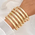 Exaggerated golden smooth metallic bangle bracelet set for women, stylish variant view - 6815601HB