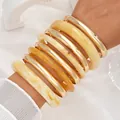Elegant gold-toned metal and yellow marble resin stacked bangle bracelet set for women - 6812401HB