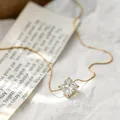 Elegant gold necklace featuring a brilliant square zircon pendant in a claw setting. - Rhombus Diamond Style / Gold