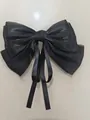 Elegante fermaglio per capelli con fiocco nero oversize e lunghi nastri di raso. - Nastro Perlescente (N. 29) / Nero
