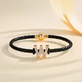 Fashionable black braided leather initial W bracelet with magnetic clasp and rhinestones - Letter W (PSL221--W)