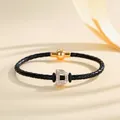 Braided black leather bracelet with gold magnetic clasp and rhinestone letter D charm - Letter D (PSL221--D)