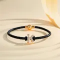 Elegant braided leather bracelet featuring a gold-tone magnetic clasp and rhinestone letter K - Letter K (PSL221--K)