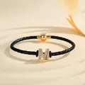 Braided black leather bracelet with paved crystal letter M and gold magnetic clasp - Letter M (PSL221--M)