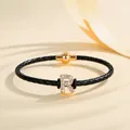Black braided leather bracelet featuring a gold magnetic clasp and rhinestone letter R charm - Letter R (PSL221--R)
