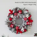 40cm festive Christmas wreath featuring red bows, snow-flocked pine needles, and ornaments - 40cm Red Wreath
