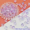 Nahaufnahme von 11 mm lila Liuli-Facettenperlen für die handgefertigte Schmuckherstellung - Pink Purple Lion Dance