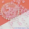 Detailansicht von 11 mm rosa Lampwork-Perlen für die DIY-Schmuckherstellung und Basteln - Zartrosa Löwentanz